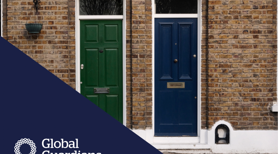 Image of two doors side by side on a red brick house